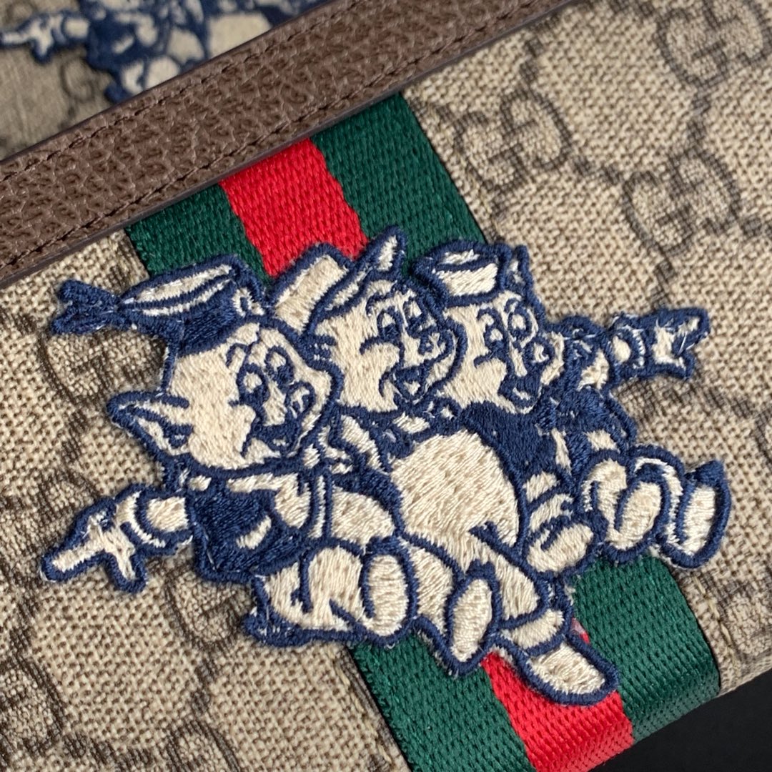 古驰【# gucci·leather #】原单品质??，三只小猪图案高级人造帆布拉链包