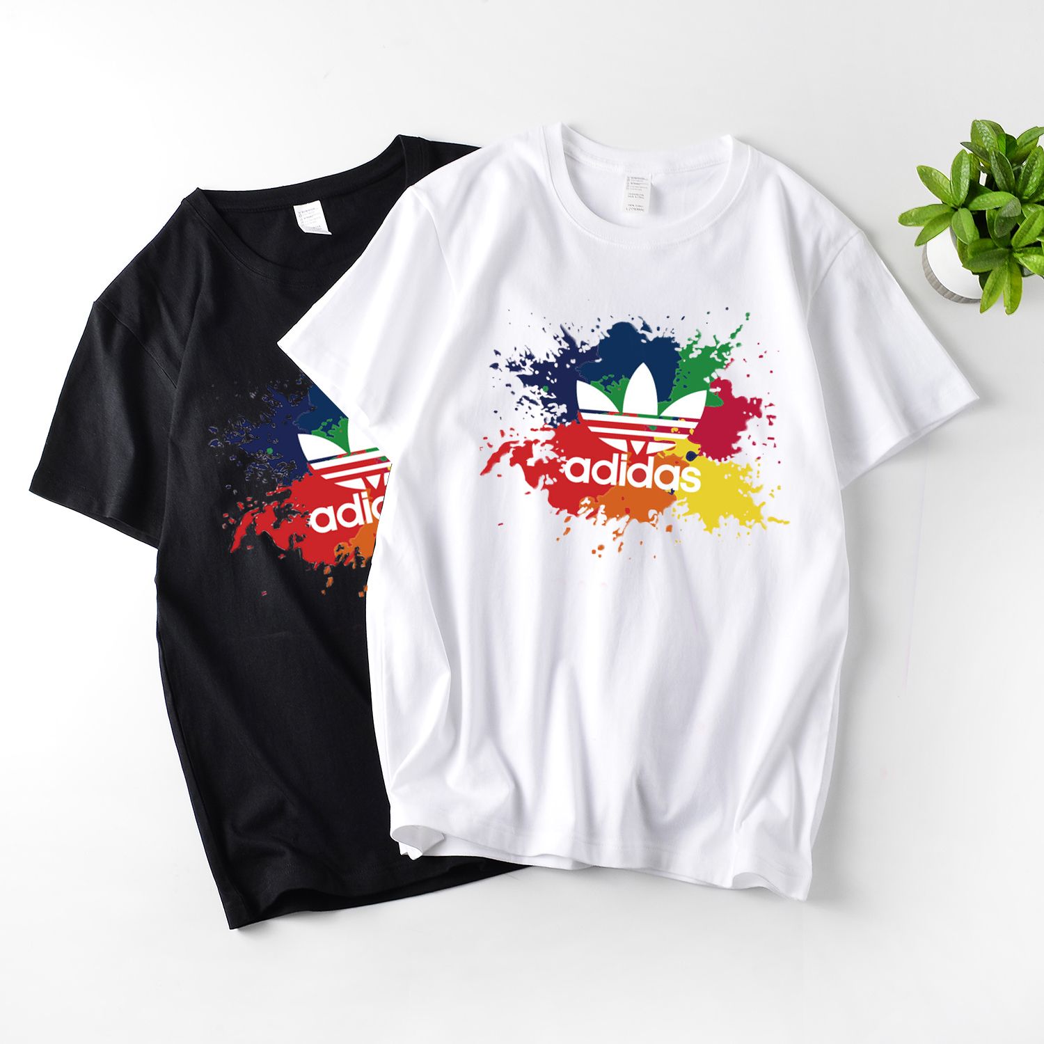 40 adidas三叶草七彩大图案休闲半袖!七彩的泼墨底色让青春不