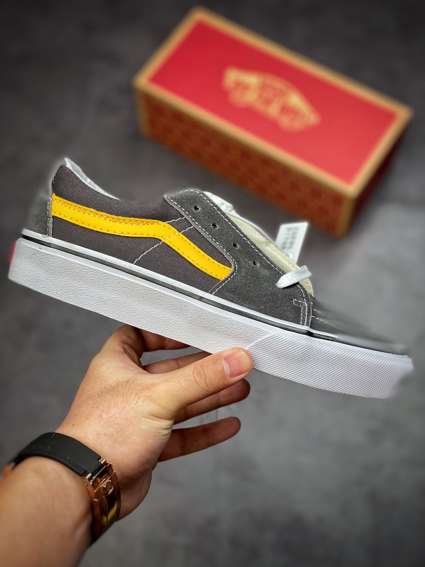 Shawn Yue with the same Vans Sk8-Low black and yellow VANS Vans Sk8-Low VN0A4UUKB61