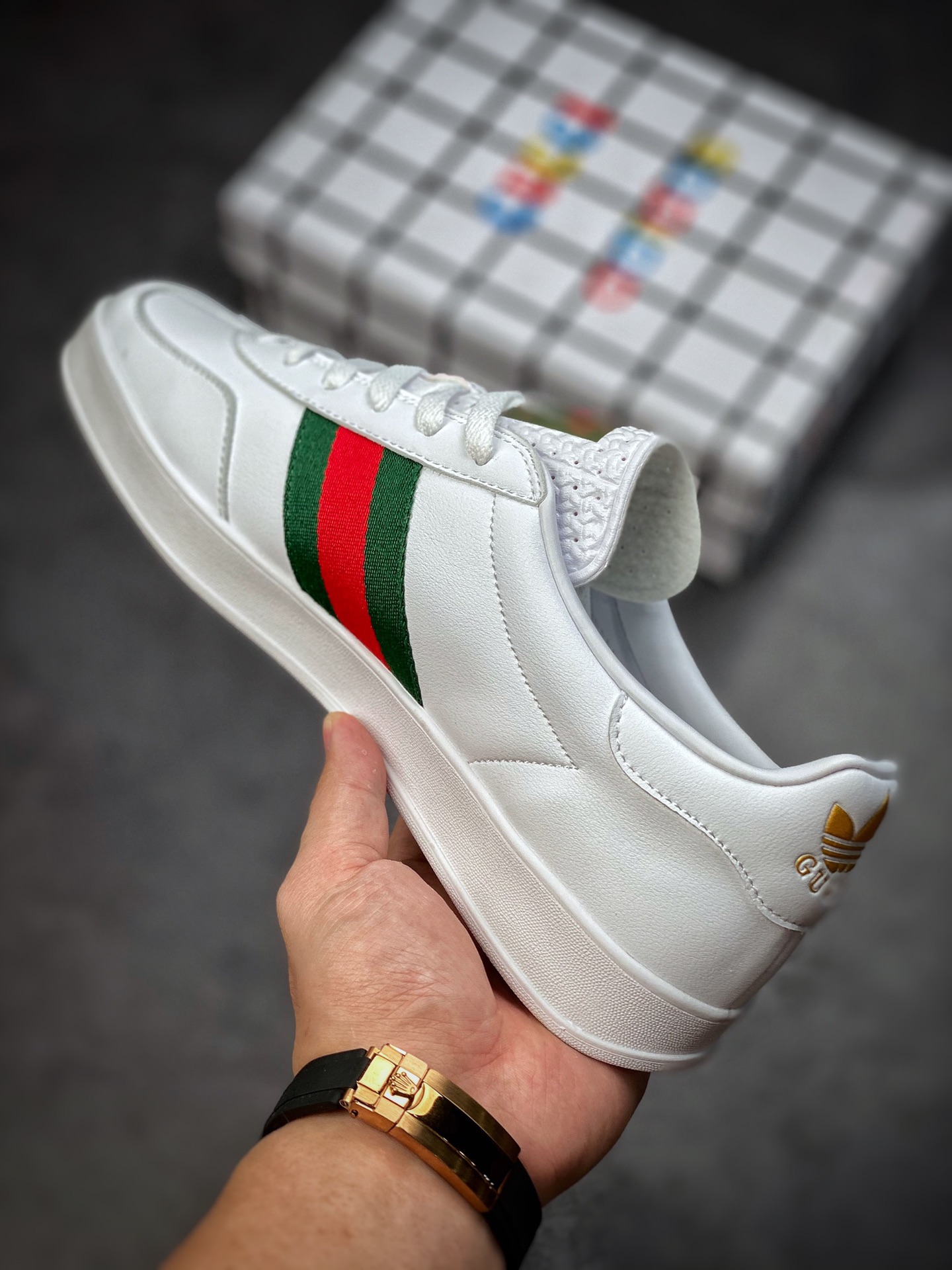 Adidas x GUCCI blockbuster co-branded clover logo and iconic three-bar as design elements