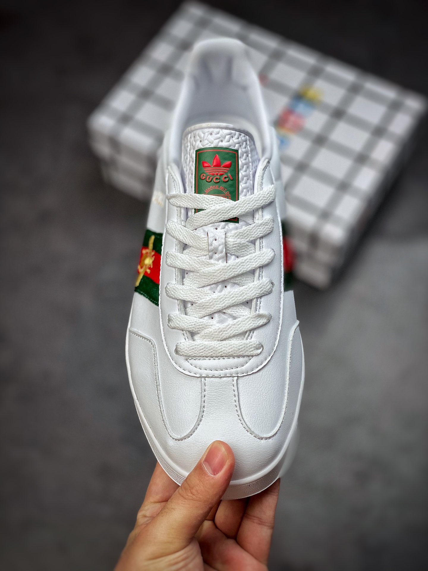 Adidas x GUCCI blockbuster co-branded clover logo and iconic three-bar as design elements