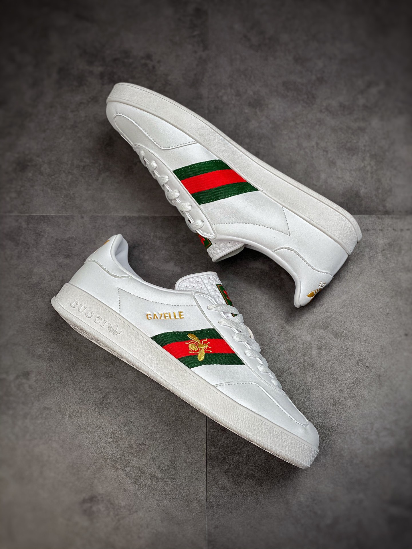 Adidas x GUCCI blockbuster co-branded clover logo and iconic three-bar as design elements