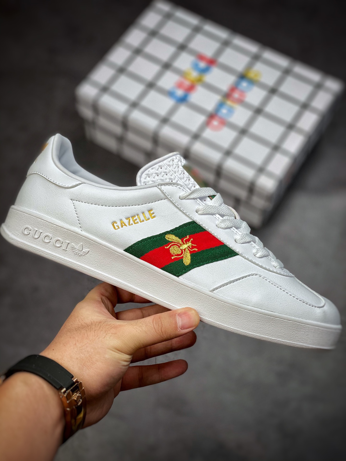 Adidas x GUCCI blockbuster co-branded clover logo and iconic three-bar as design elements