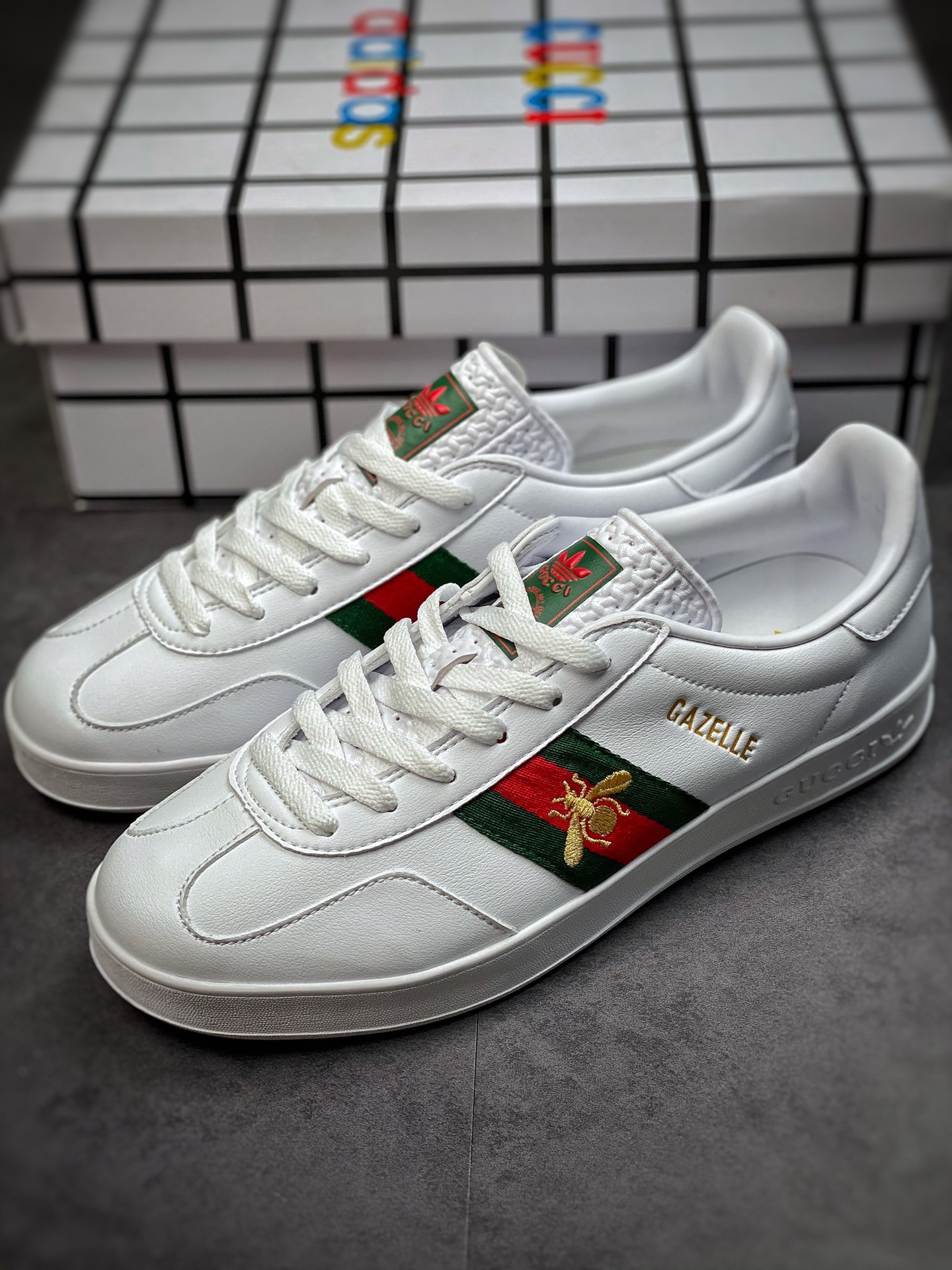 Adidas x GUCCI blockbuster co-branded clover logo and iconic three-bar as design elements