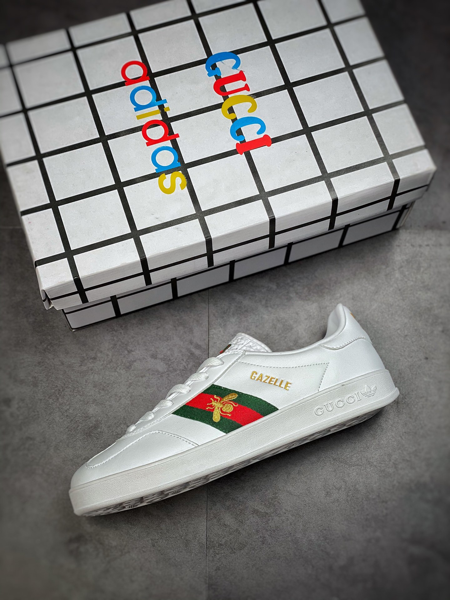 Adidas x GUCCI blockbuster co-branded clover logo and iconic three-bar as design elements