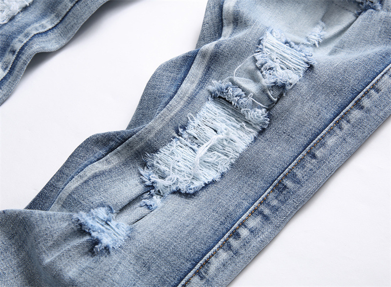 “Autonomous AMIRI Purple Cobra Embroidered Jeans: Hand-Coded Logo Buttons, Light Blue, Sizes S-XL” - 图片 6