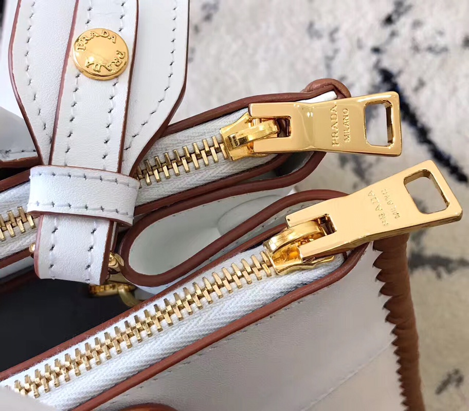 PRADA普拉达进口十字纹牛皮手提包1BA102