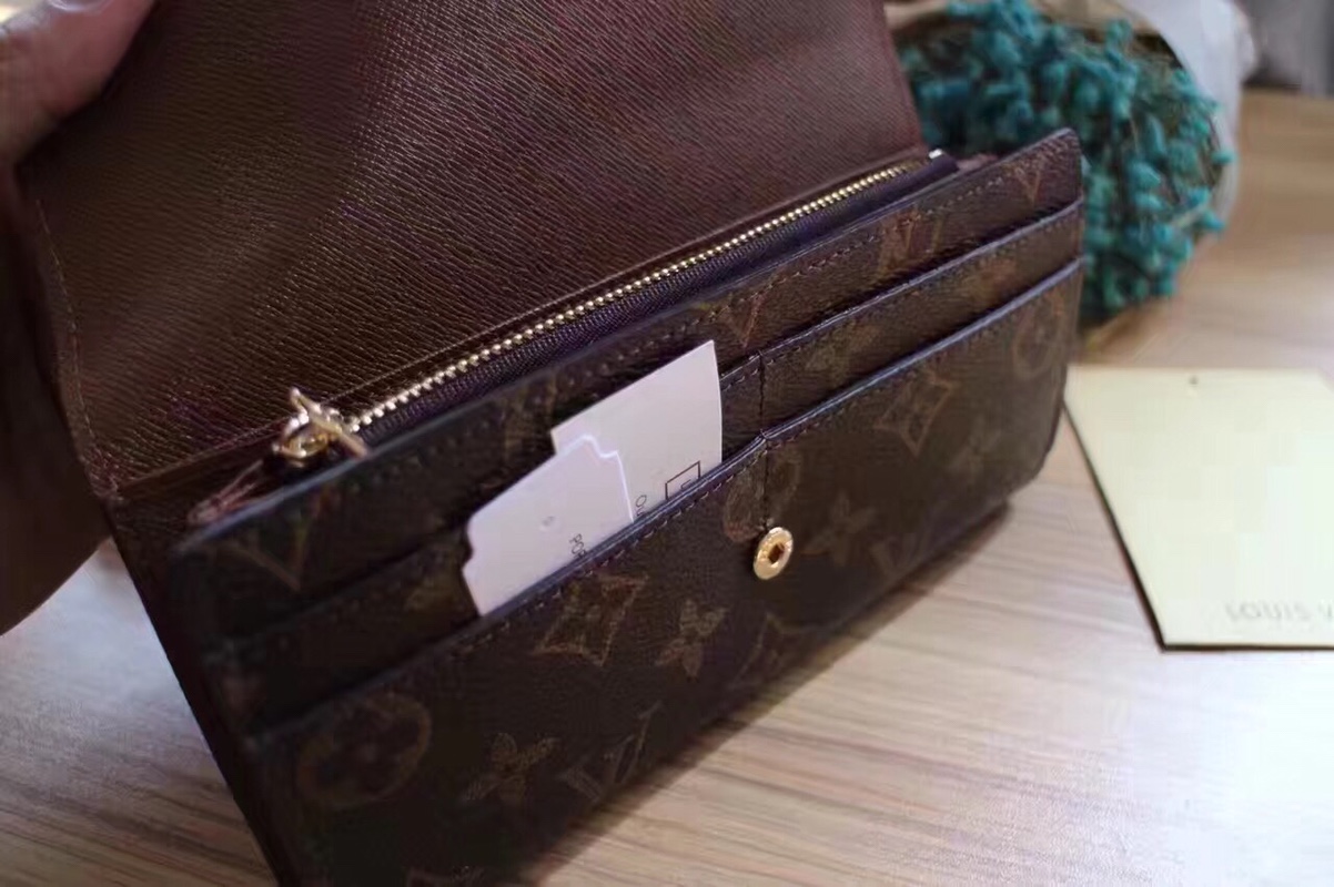 エレガントなモノグラム帆布の信封式財布