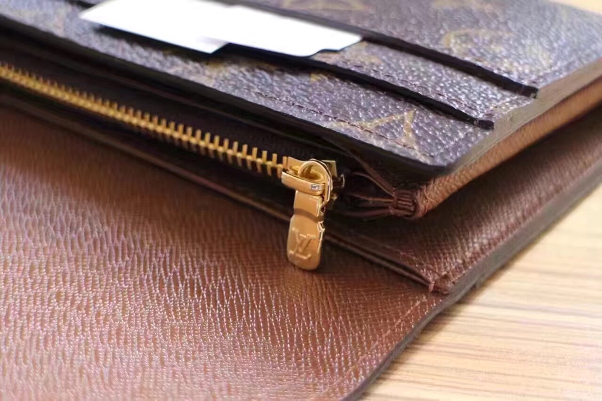 エレガントなモノグラム帆布の信封式財布