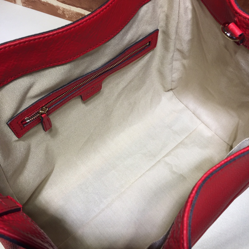 GUCCI古驰女士牛皮时尚双G浮雕纯色手提包282309