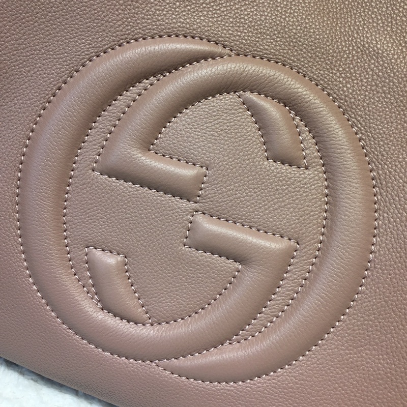 GUCCI古驰女士牛皮时尚双G浮雕纯色手提包282309