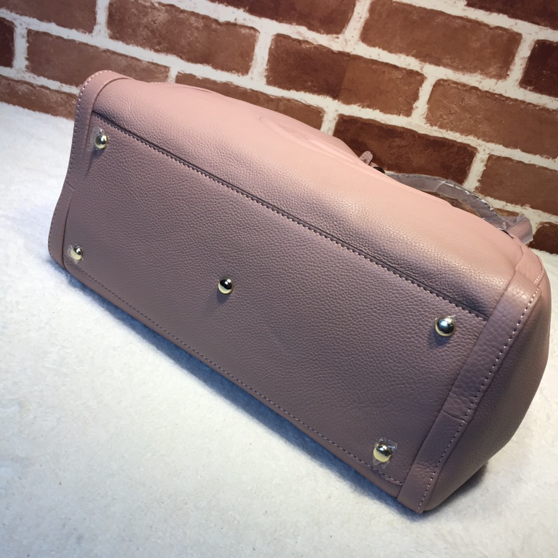 GUCCI古驰女士牛皮时尚双G浮雕纯色手提包282309