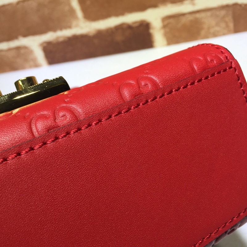 GUCCI古驰皮革双G压印肩背包409487