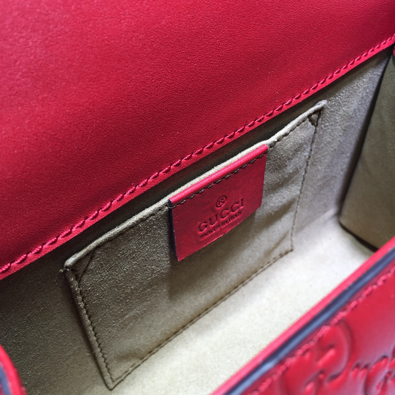 GUCCI古驰皮革双G压印肩背包409487