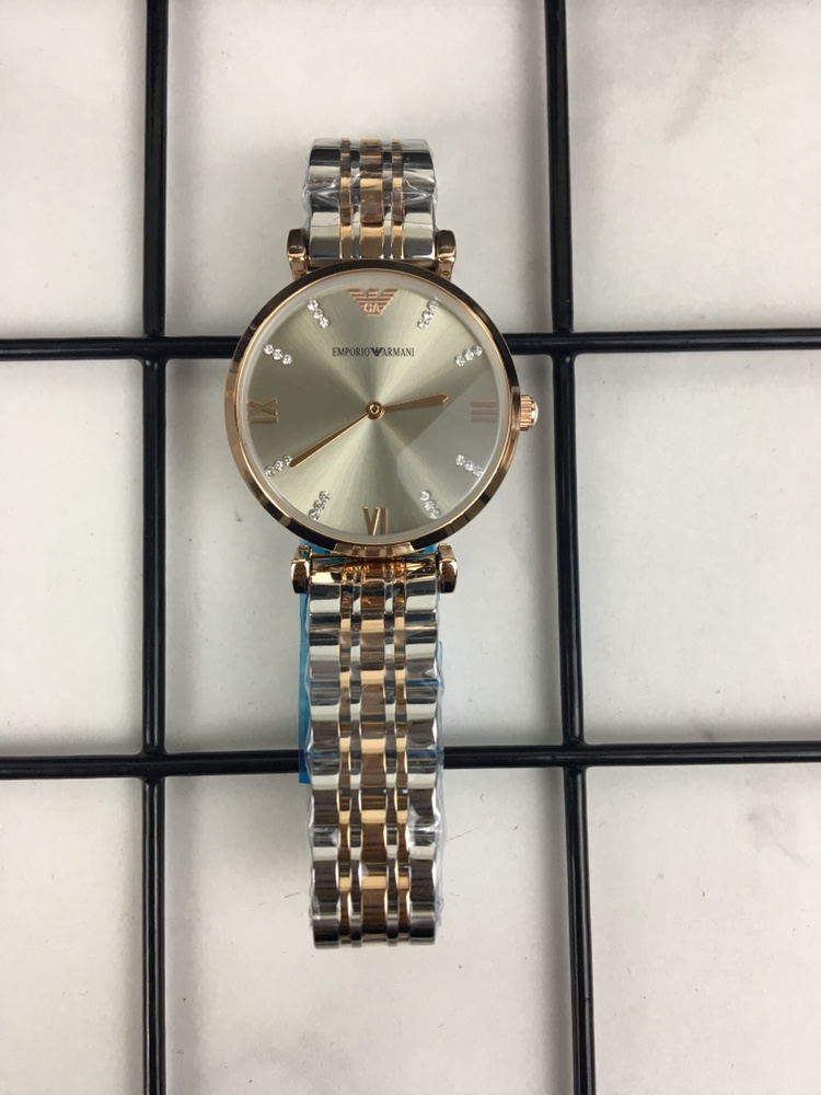 J0  Emporio Armani  阿玛尼GIANNI T-B系列真皮石英女表 随性造型简约而不失优雅Emporio Armani 腕表造型时尚 为摩登女性打造的专属经典系列