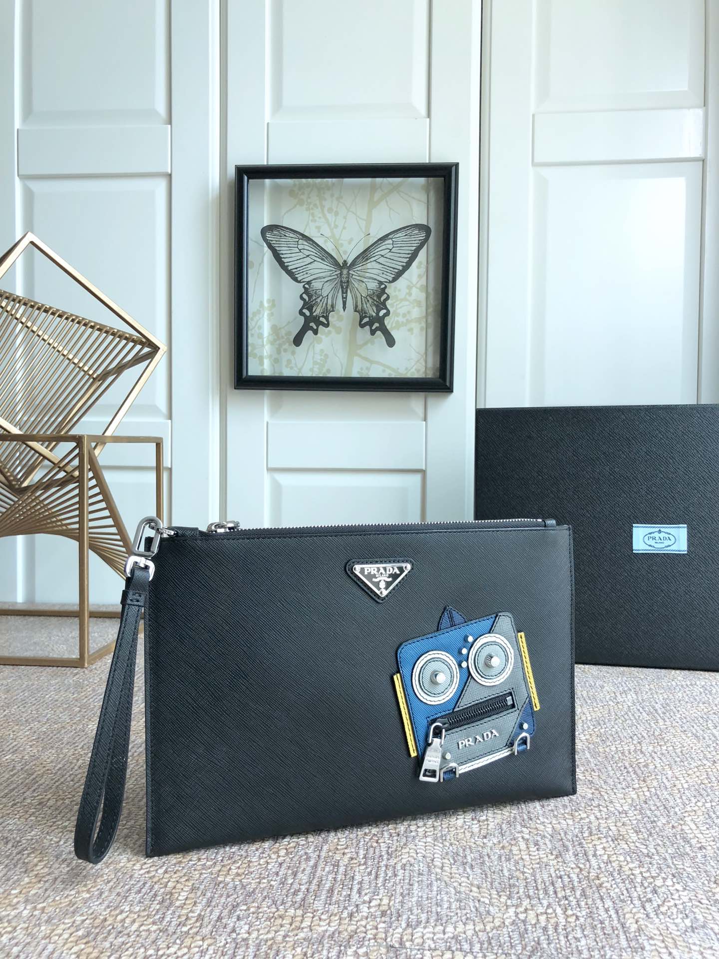 PRADA普拉达进口十字纹牛皮男士手包2VG005