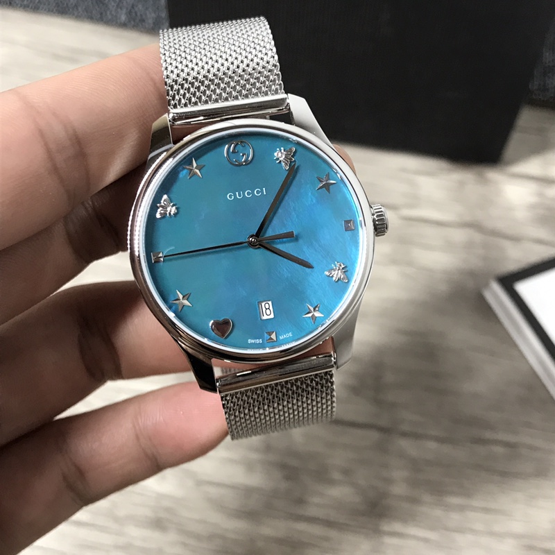 NO:388590,Batch: Original box: 30 Gucci counter latest Little Bee Quartz Women's Watch, 36mm polished stainless steel thin case, 5mm ultra-thin thickness, paired with interlocking G crown, original authentic Gucci G-TIMELESS Gucci series belt model, bringing you summer freshness. There are many beautiful colors, dial 38mm, anti-glare sapphire glass, 316 stainless steel case, Gucci representative embossed leather not only used for the strap, but also smoothly extends to the surface. The bee shape and Gucci logo are both set at 12 o'clock, with unique design. The calfskin strap is close to the arm, equipped with a full set of packaging and supports inspection. The dial of natural fritillaria, equipped with stars and planetary patterns, Gucci scale interlocking  G, bees, stars, rivets and heart-shaped, snap-button bottom cover, bee carving, latest mesh belt design, original Swiss quartz movement, scratch-resistant mineral crystal glass, with anti-reflective coating, 30 meters of waterproof living. 2-year warranty, with original box, this product is amazing, it's time to get it, gucci, gucci, cowhide19860909批: 原盒:30 Gucci专柜最新小蜜蜂石英女表,36毫米抛光不锈钢薄表壳,5mm超薄厚度,搭配interlocking G表冠,原厂正品古驰G-TIMELESSGucci系列皮带款,带给你夏季的清新.有多种美丽的色彩,表盘38mm、防眩目蓝宝石玻璃、316精钢表壳,Gucci代表性的压花皮不仅用于表带,也流畅地延伸到表面上.蜜蜂造型和Gucci标识均设于12点钟位置,设计独特.小牛皮表带紧贴手臂,配全套包装、支持验货.天然贝母的表盘,配以星星和星球图案,Gucci刻度interlocking G、蜜蜂、星星、铆钉和心形,按扣底盖,配以蜜蜂雕花,最新款网带设计,原装瑞士石英机芯,耐划伤矿物水晶玻璃,配以防反光涂层,30米生活防水.2年质保,配原盒,厉害了这个货,要的快了,,gucci,gucci,cowhide,Watch