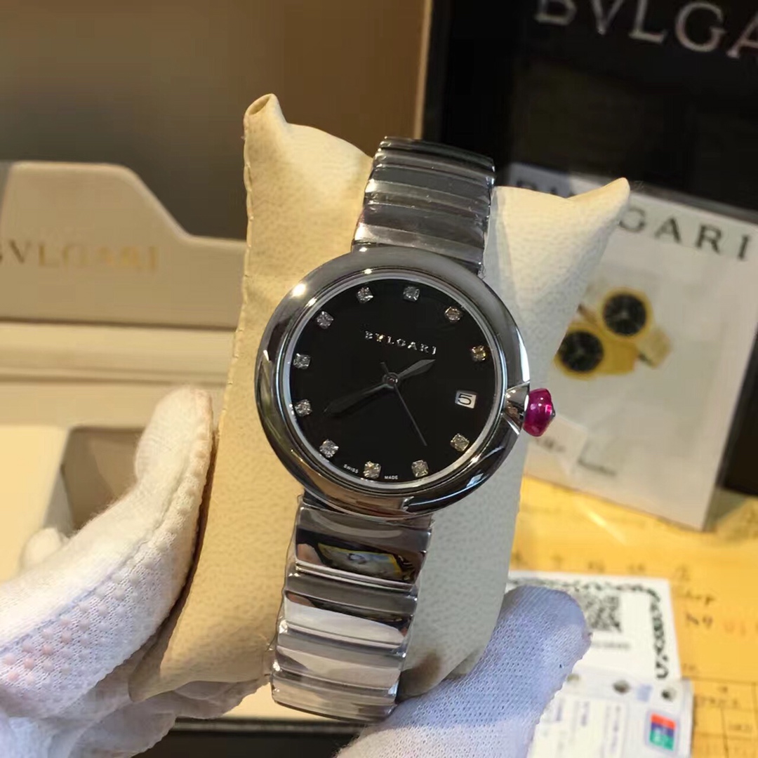 Bvlgari Lvcea stainless steel case and bracelet, white mother-of-pearl dial, pink cabochon crown 33mm Women's Quartz