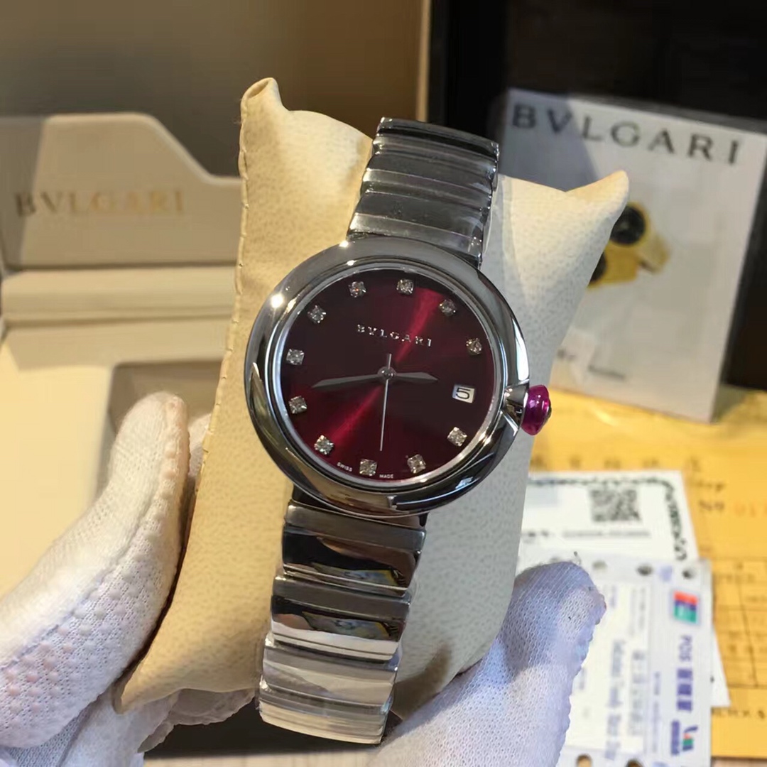 Bvlgari Lvcea stainless steel case and bracelet, white mother-of-pearl dial, pink cabochon crown 33mm Women's Quartz