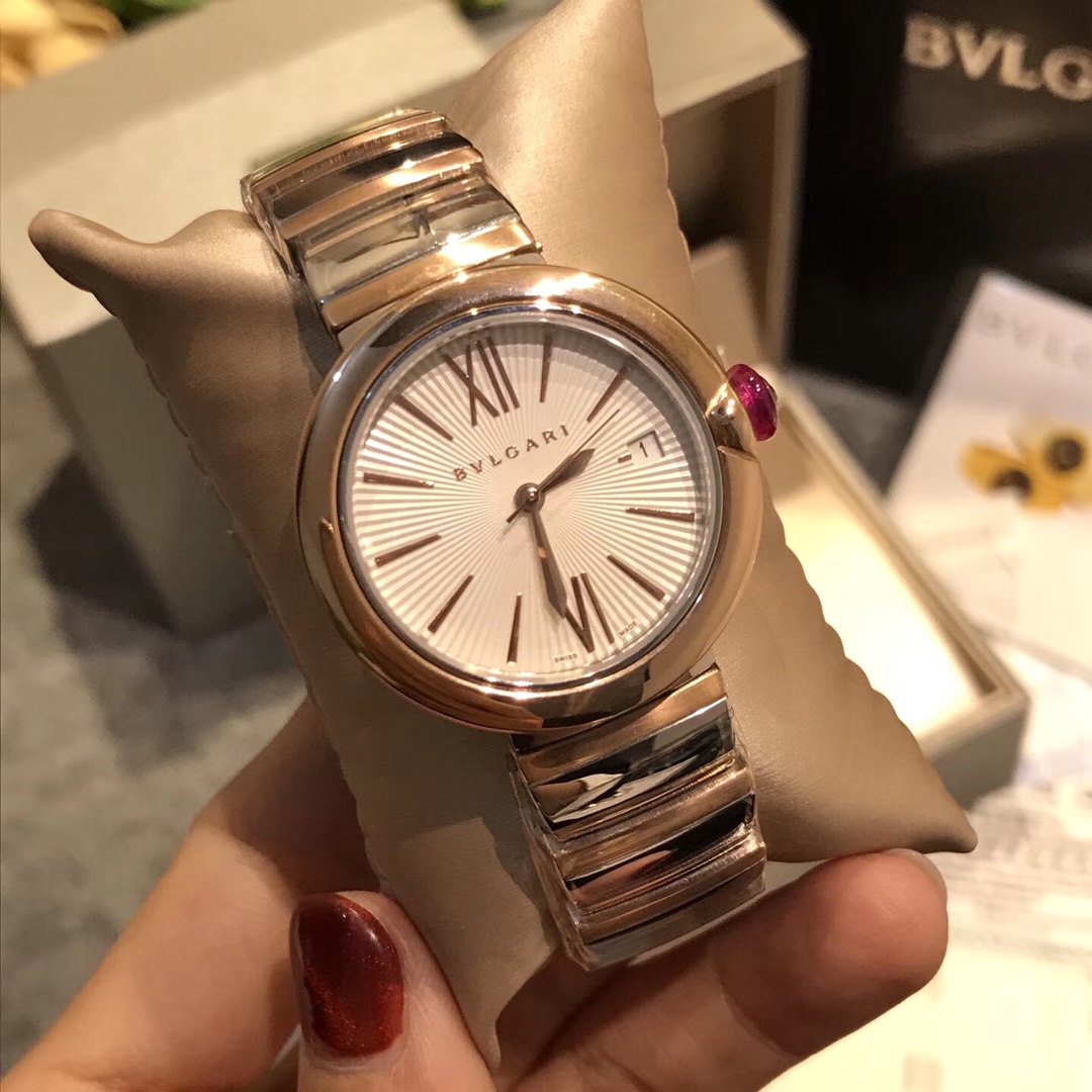 Bvlgari Lvcea Rose gold-tone case, diamond-set bezel, burgundy dial, silver-tone bracelet 33mm Women's Quartz