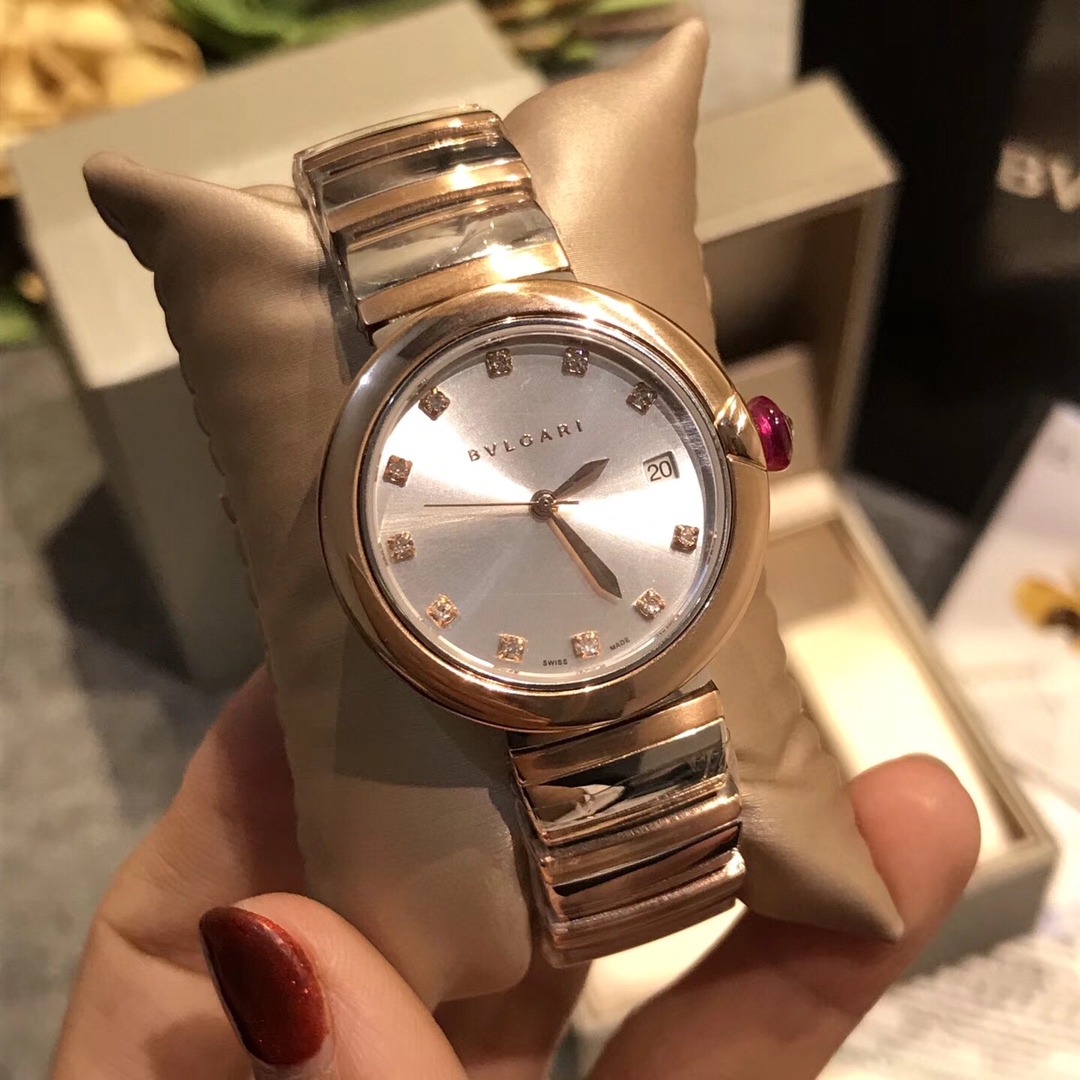 Bvlgari Lvcea Rose gold-tone case, diamond-set bezel, burgundy dial, silver-tone bracelet 33mm Women's Quartz