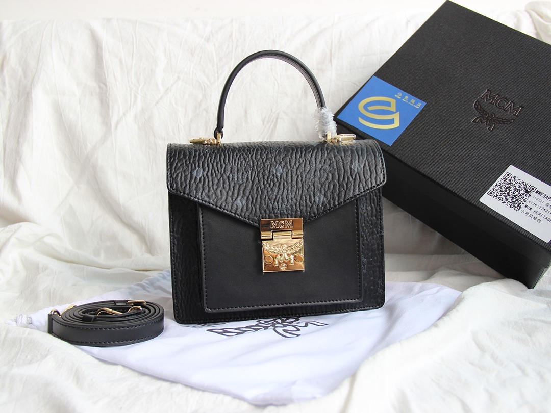 Top-tier MCM Accordion Bag Series - a perfect blend of classic shape and modern design. Made with high-quality leather, faithfully replicating the original. Sturdy and spacious, can be worn over the shoulder or carried by hand. Features multiple accordion-style compartments inside. Small size: 17*21*8cm, Medium size: 27*19.5*11cm. Small and medium sizes available. image 1