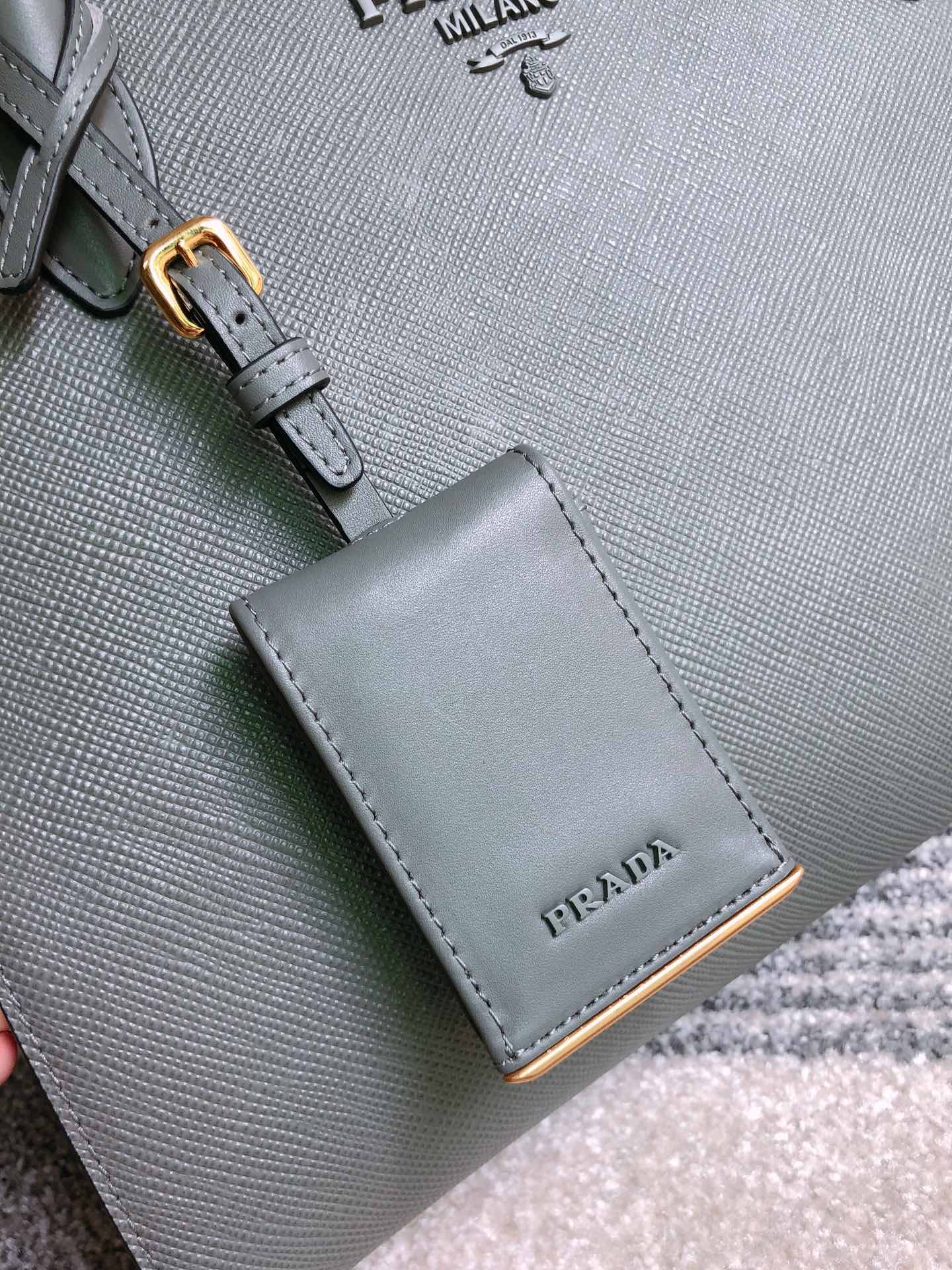 PRADA普拉达进口粗十字牛皮手提包1BA155