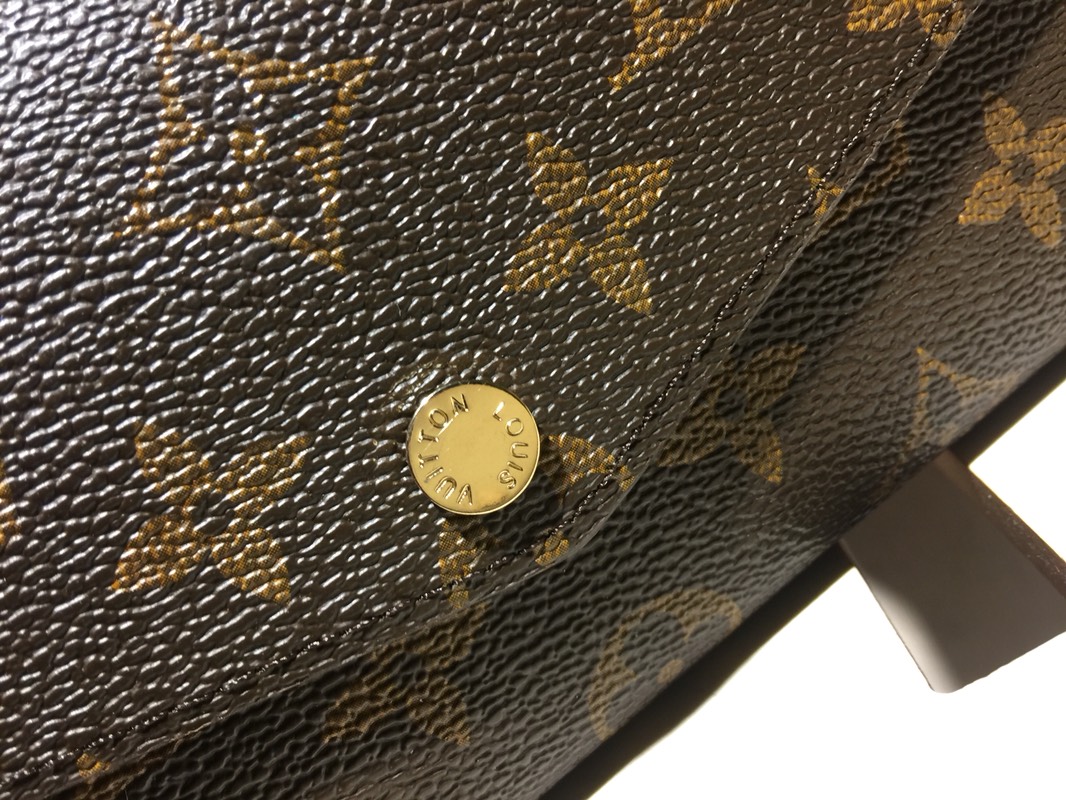 エレガントなモノグラム帆布の信封式財布