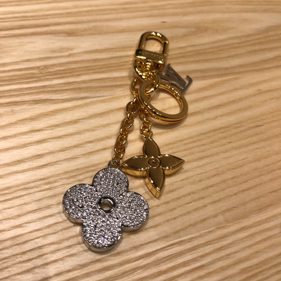 Blooming flower keychain at different angles