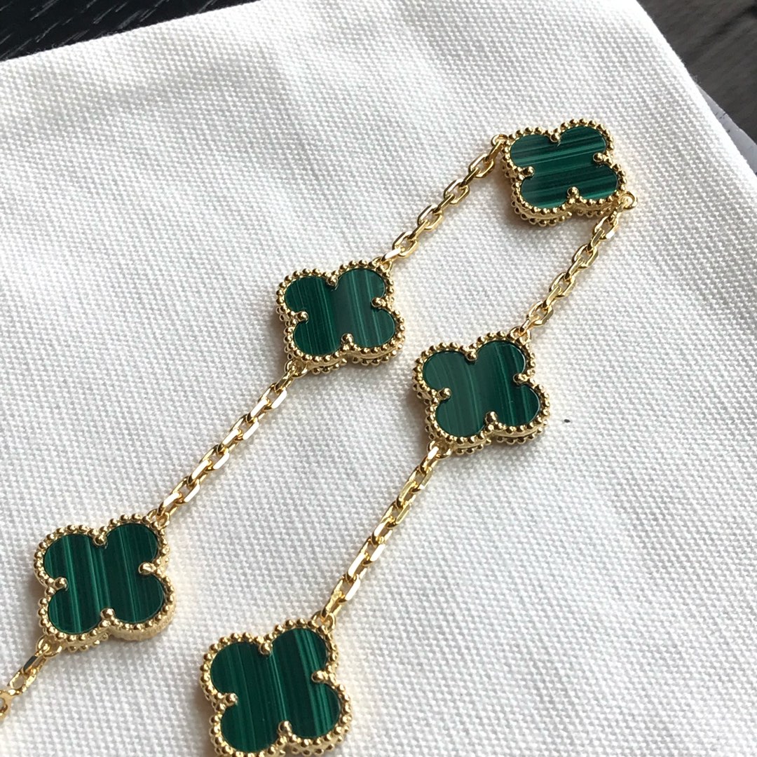 Van Cleef & Arpels 红玉髓/白母贝/黑玛瑙/孔雀石