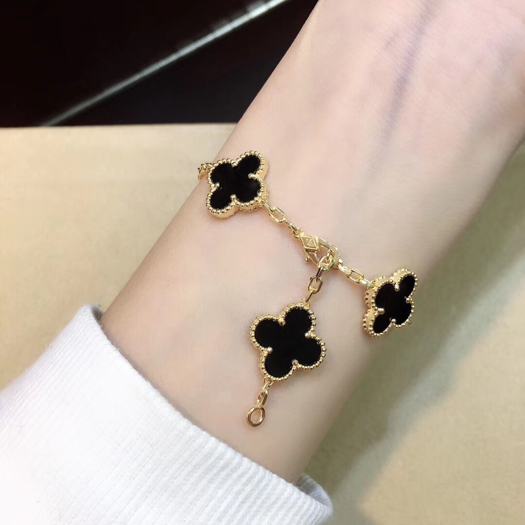Van Cleef & Arpels 红玉髓/白母贝/黑玛瑙/孔雀石