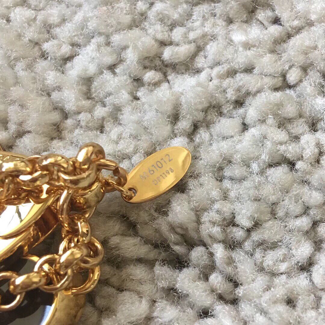 Close-up of FLEUR DE MONOGRAM Black Keychain leather texture