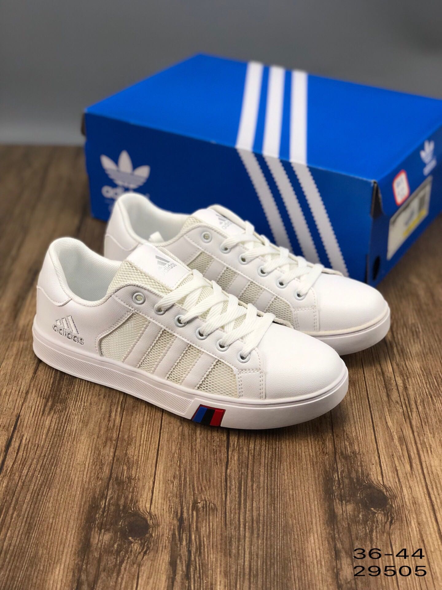 100阿迪达斯 MEN 皮面透气网面 镂空 透气 校园休闲文化板鞋