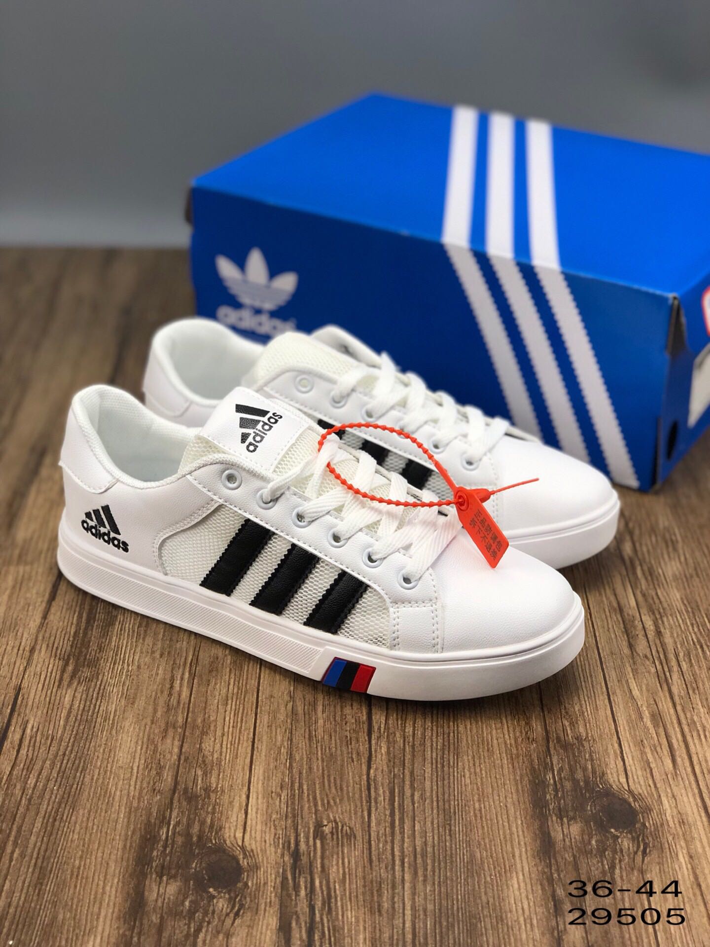 100阿迪达斯 MEN 皮面透气网面 镂空 透气 校园休闲文化板鞋