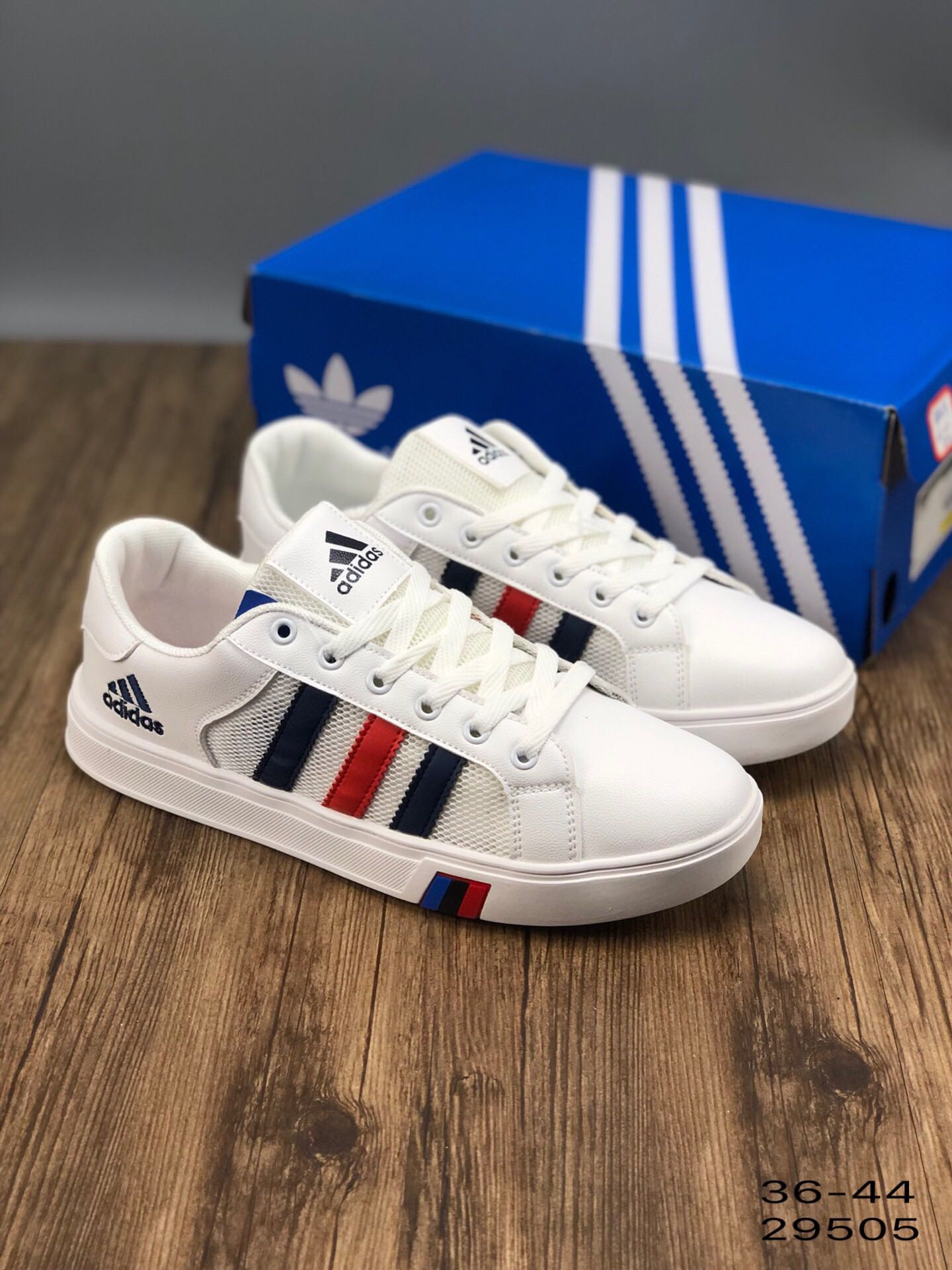 100阿迪达斯 MEN 皮面透气网面 镂空 透气 校园休闲文化板鞋