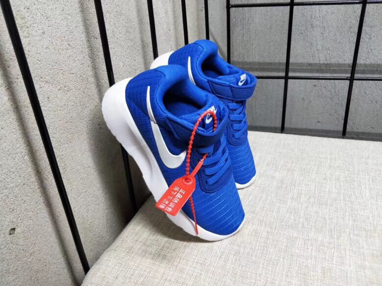 65<br />夏季疯狂小跑 码数:26--35     <br />真标1.1 Nike伦敦三代魔术贴童鞋 非通货 欢迎对比，看细节！ 材质:MD大底+海玻璃鞋垫+PU Logo一年不会掉+大底双层贴盒+注胶孔+原版正品扣！独家夏季疯狂小跑 <br />码数:26 27 38 39 30 31 32 33 34 35<br />三代童鞋实际鞋垫长<br />26码内长16.5CM。 <br />27码内长17.2CM。<br />28码17.8CM。 <br />29码内长18.5CM。<br />30码内长19.1CM。<br />31码内长19.8CM。<br />32码内长20.5CM。<br />33码内长21.1CM。<br />34码内长21.8CM。 <br />35码内长22.5CM。