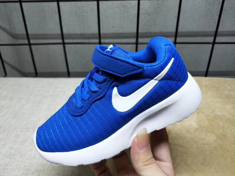 65<br />夏季疯狂小跑 码数:26--35     <br />真标1.1 Nike伦敦三代魔术贴童鞋 非通货 欢迎对比，看细节！ 材质:MD大底+海玻璃鞋垫+PU Logo一年不会掉+大底双层贴盒+注胶孔+原版正品扣！独家夏季疯狂小跑 <br />码数:26 27 38 39 30 31 32 33 34 35<br />三代童鞋实际鞋垫长<br />26码内长16.5CM。 <br />27码内长17.2CM。<br />28码17.8CM。 <br />29码内长18.5CM。<br />30码内长19.1CM。<br />31码内长19.8CM。<br />32码内长20.5CM。<br />33码内长21.1CM。<br />34码内长21.8CM。 <br />35码内长22.5CM。