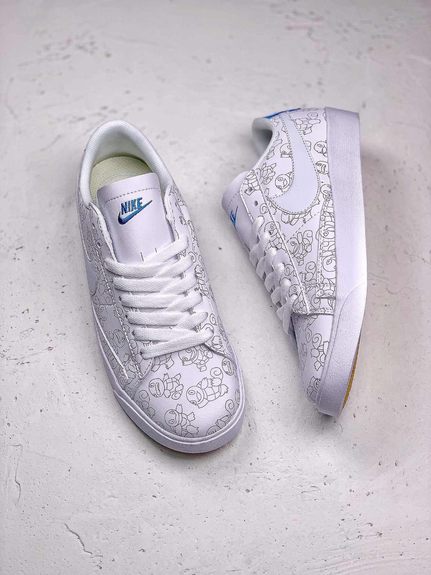 #本地130<br />NIKE W BLAZER LOW LE 杰尼龟<br />童年回忆宠物小精灵融入鞋身十分俏皮吸晴 货号：AV9371 812 SIZE：36-44