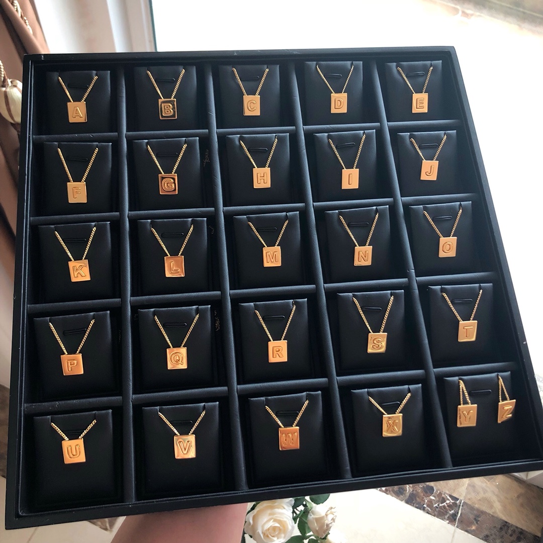 NO:104610,Celine Gold Square Letter Necklace Complete with 26 letters!  Almost every style of clothing can be matched!  It is recommended to use two pieces, one long and one short, and the chain can be adjusted!  The latest buttons are specially customized, and the letters have a strong three-dimensional feeling on the squares!  Zp is so small!  Original brass material, high-end customization!  ,celine,celine,celine,necklace19860909Celine 赛琳 金方块字母项链 26个字母齐全！几乎每一种风格的衣服都可以搭！建议两枚入手一长一短搭配,链子可调节！特别定制最新扣子,字母在方块上有强烈立体感！Zp好小几千！原版黄铜材质,高级定制！,塞琳,celine,celine,necklace,Jewelry