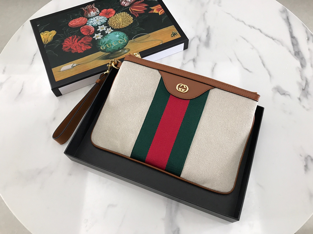 G Brand New Release 🔥 Latest clutch crafted from vintage canvas and premium faux leather, featuring classic red-green webbing and top-quality overseas hardware. A must-have fashion item. Color: Brown leather & linen Fabric No.: 576053 Size: 29*20 cm 433043 image 1
