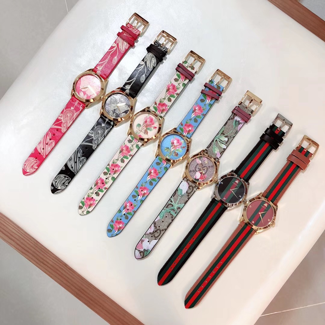 Gucci 古驰 Original GUCCIG-timeless系列 表盘不锈钢芙蓉黑花卉皮革