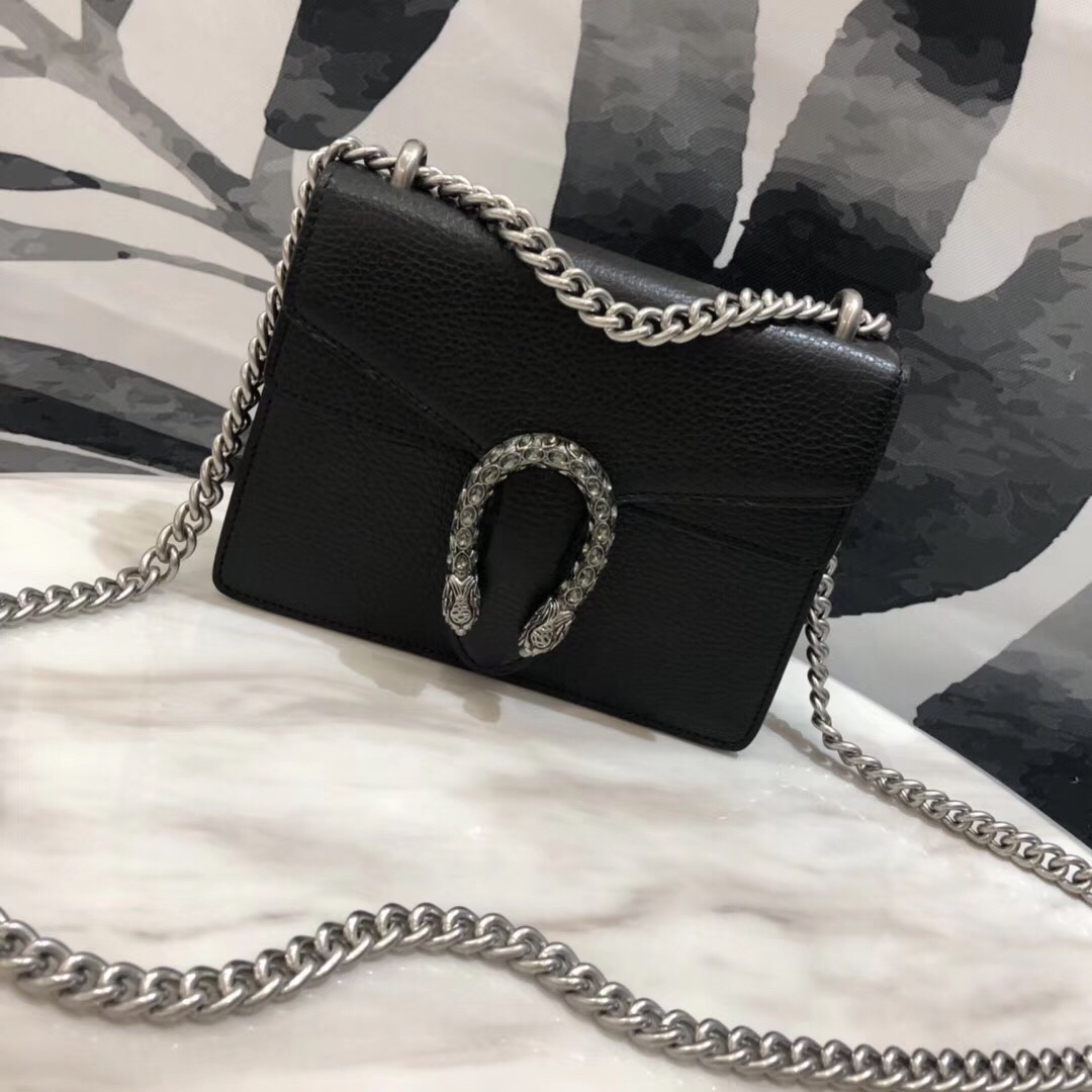 # Bacchus# Model 421970, size 20*15.5*5. Original top-grade imported cowhide with excellent texture and a cool design. Very durable, stylish, and practical. Features crystal Bacchus embellishments paired with woven cowhide for an elegant and noble look. Adorned with Swarovski double tiger head clasps, making it irresistible. Can be worn crossbody or on one shoulder—wear it any way you like, it always looks stunning. Code 655068. image 1