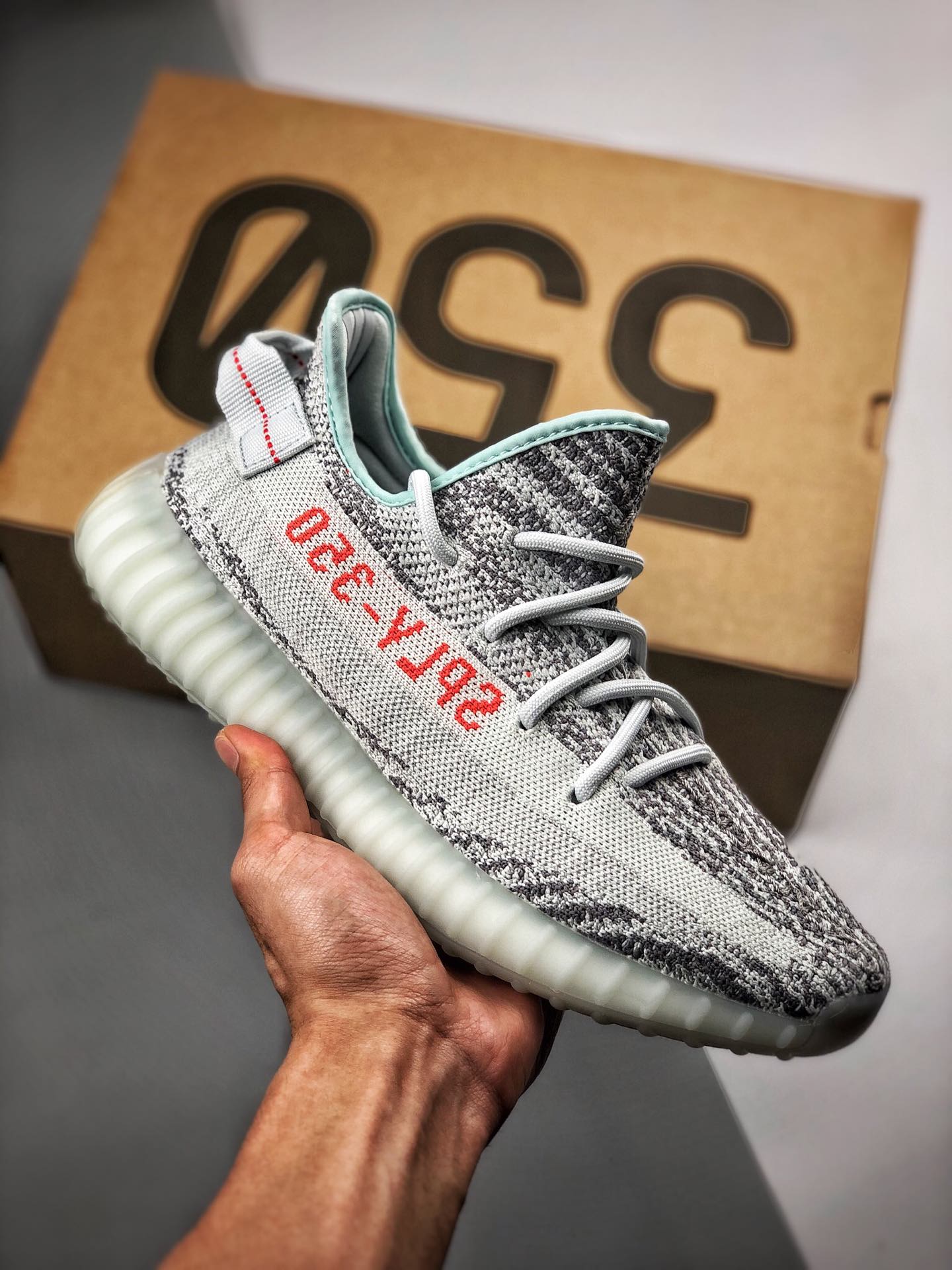 Apoyo pago contra reembolso Yeezy 350 Boost V2 azul hielo, pedido designado por clientes de comercio exterior, tejido o…