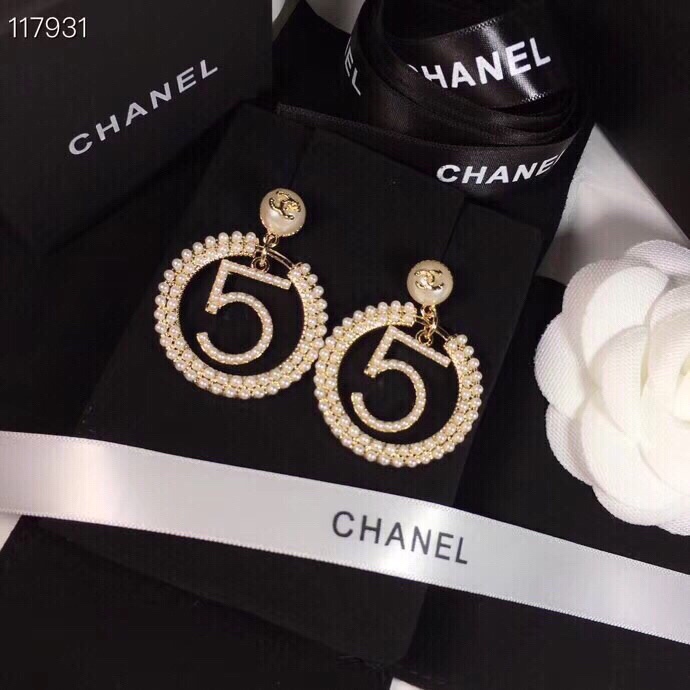 chanel gold crystal spiral cc stud earrings