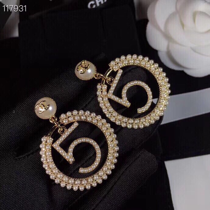 chanel gold crystal spiral cc stud earrings