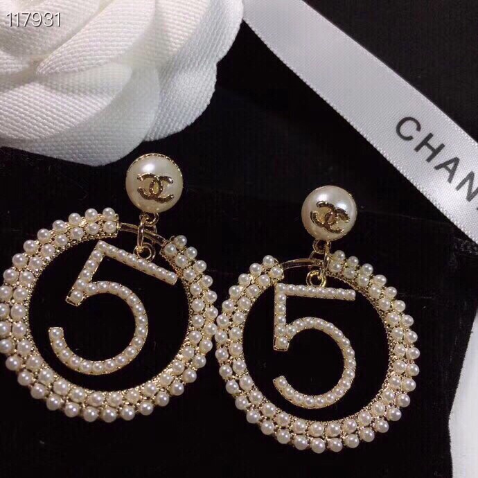 chanel gold crystal spiral cc stud earrings