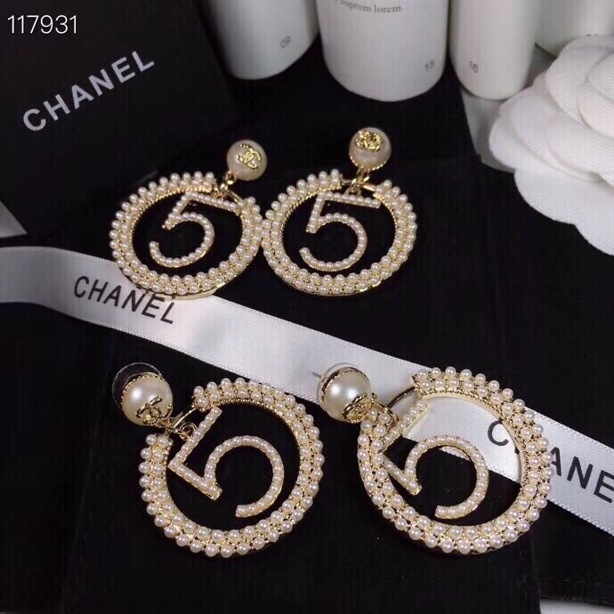 chanel gold crystal spiral cc stud earrings