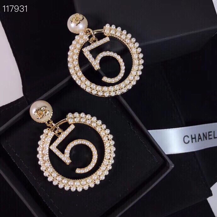chanel gold crystal spiral cc stud earrings
