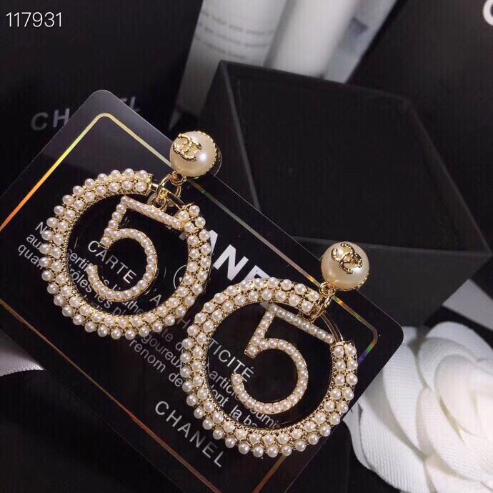 chanel gold crystal spiral cc stud earrings