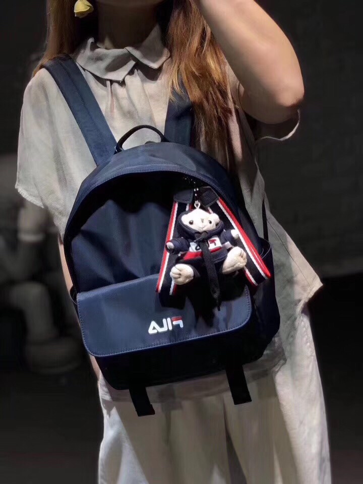 NO:827928,FILA Bear Pendant Backpack, for foreign trade orders, the nylon of this bag is particularly thick!  The first thing I felt when I picked it up was that the quality is very good. The inner pockets and pullers are decorated with the brand's iconic red, white and black. The pendant bear doll is made with special care. The clothes and pants are made separately and can be taken off. The OEM cost of this design is extremely high, because it is made using the same process as the clothes and pants worn by normal adults!  The joints of the straps are repeatedly reinforced and sewn. It is definitely a very durable and good bag, backpacks,19860909斐乐FILA小熊挂饰双肩背包,外贸订单追单,这个包的尼龙特别厚实！上手的第一感觉就是质量特别好,内兜包边和拉头都采用品牌标志性的的红白黑装饰,挂件的小熊公仔,做的特别用心,衣服和裤子都是单独制作的,都可以脱下,这种设计代工费用极高,因为完全是和正常大人穿的衣服裤子完全一样的程序制作出来的！背带连接处都是反复加强型缝制,绝对是个特别耐用的好包,,backpacks,,Women's clothing